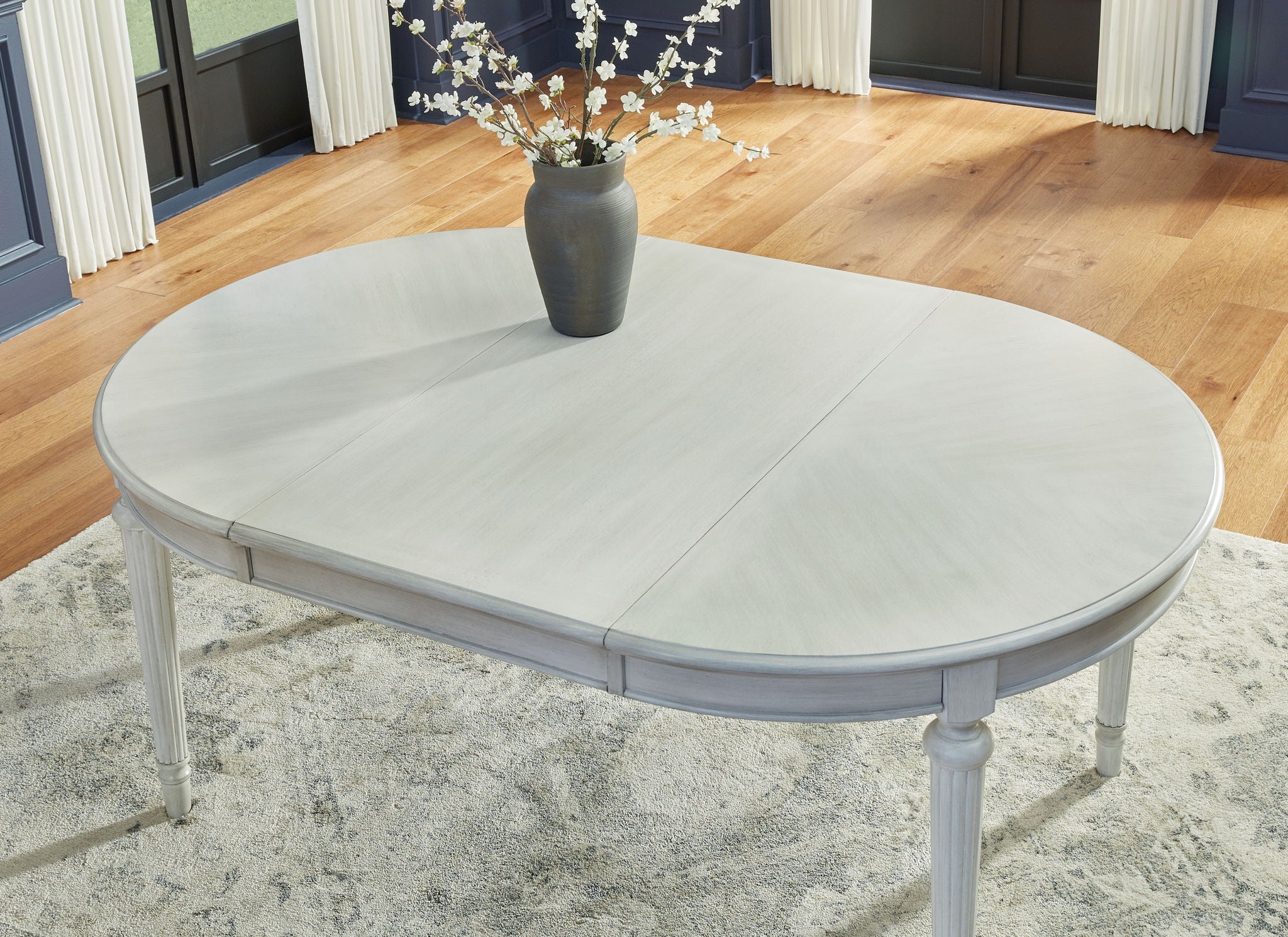 Montelaine - Oval Dining Room Extension Table - Antique White, alternate view 4 with wood construction