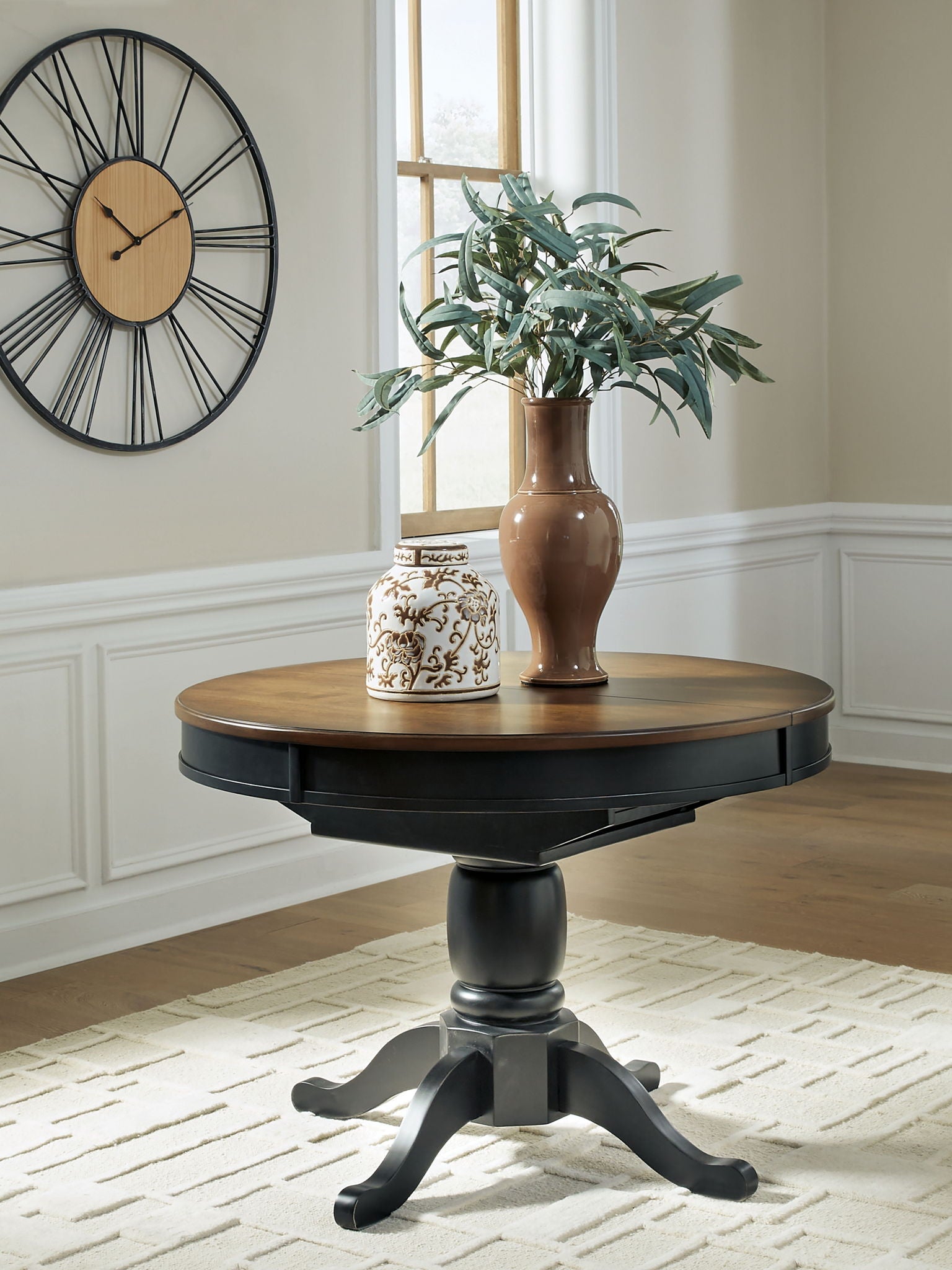 Clorazi - Oval Dining Room Butterfly Extension Table - Black / Brown, alternate view 5 with wood construction