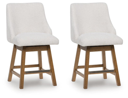 Cabalynn - Upholstered Swivel Barstool (Set of 2) - Oatmeal / Light Brown - Signature Design by Ashley® - 1