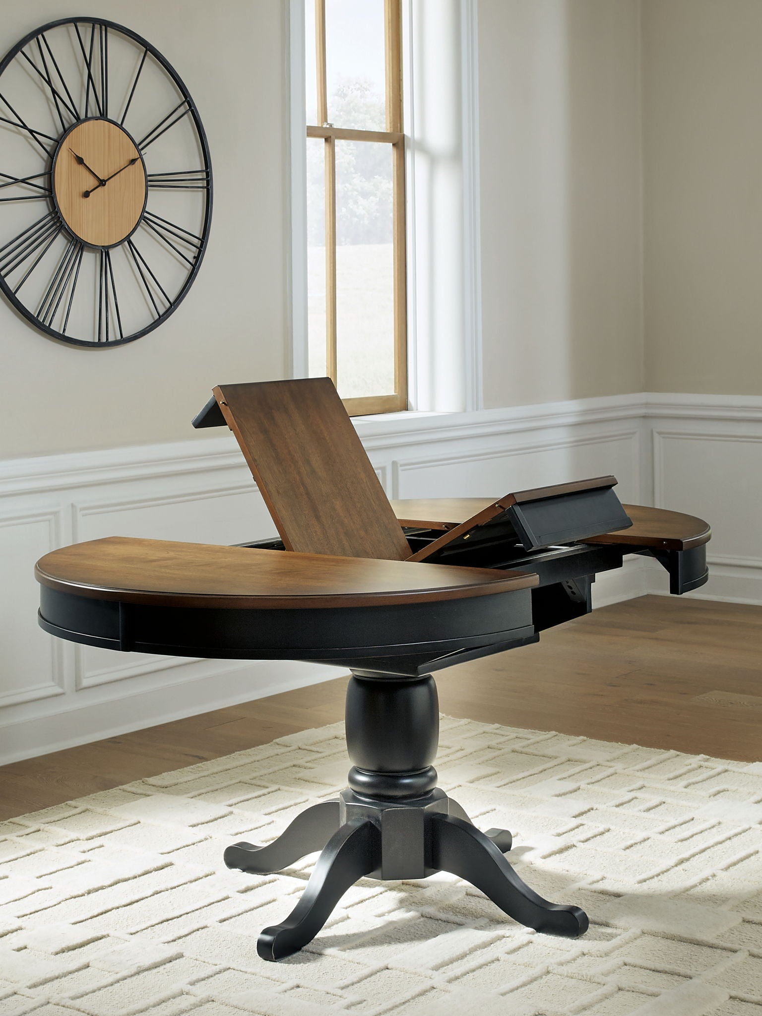 Clorazi - Oval Dining Room Butterfly Extension Table - Black / Brown, alternate view 6 with wood construction
